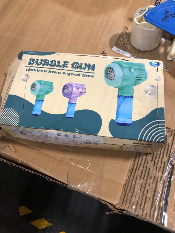 Photo 2 of Automatic Bubble Guns with Light, Zealous 2pc High Output Bubble Machines with Bubble Solution & Bubble Concentrate,Handheld Battery Operated Bubble Maker Toys for 3000+ (Bubble-White)