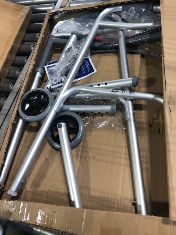 Photo 1 of Drive Medical 10210-1 Deluxe 2-Button Folding Walker with Wheels