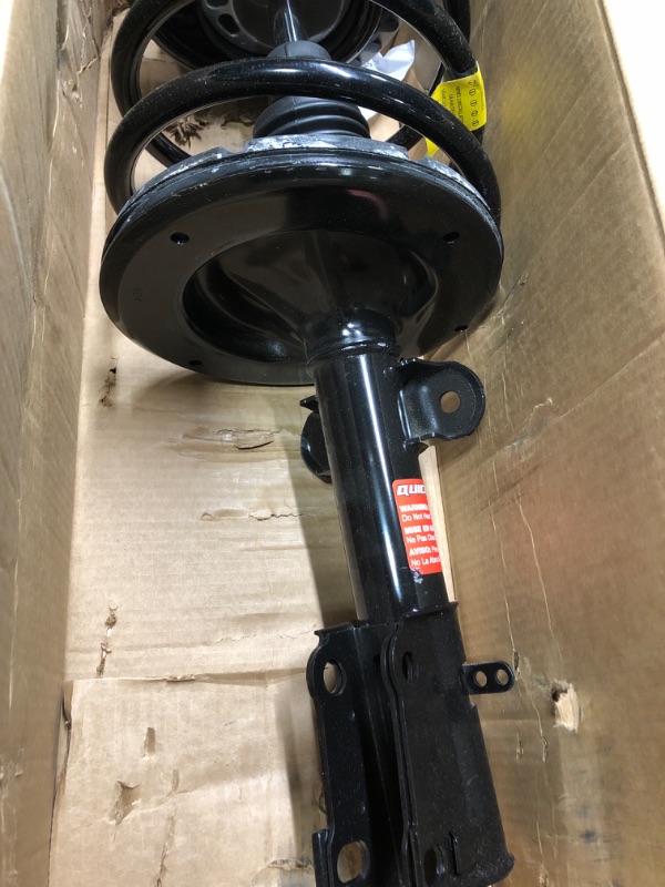 Photo 4 of Monroe Quick-Strut 171572L Suspension Strut and Coil Spring Assembly for Dodge Grand Caravan