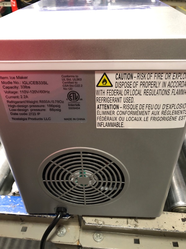 Photo 1 of Igloo Premium Countertop Ice Maker Machine, Portable Ice Maker, Produces 33 lbs. in 24 hrs. with Ice Cubes Ready in 6-8 Minutes, Comes with Ice Scoop and Basket,Silver,