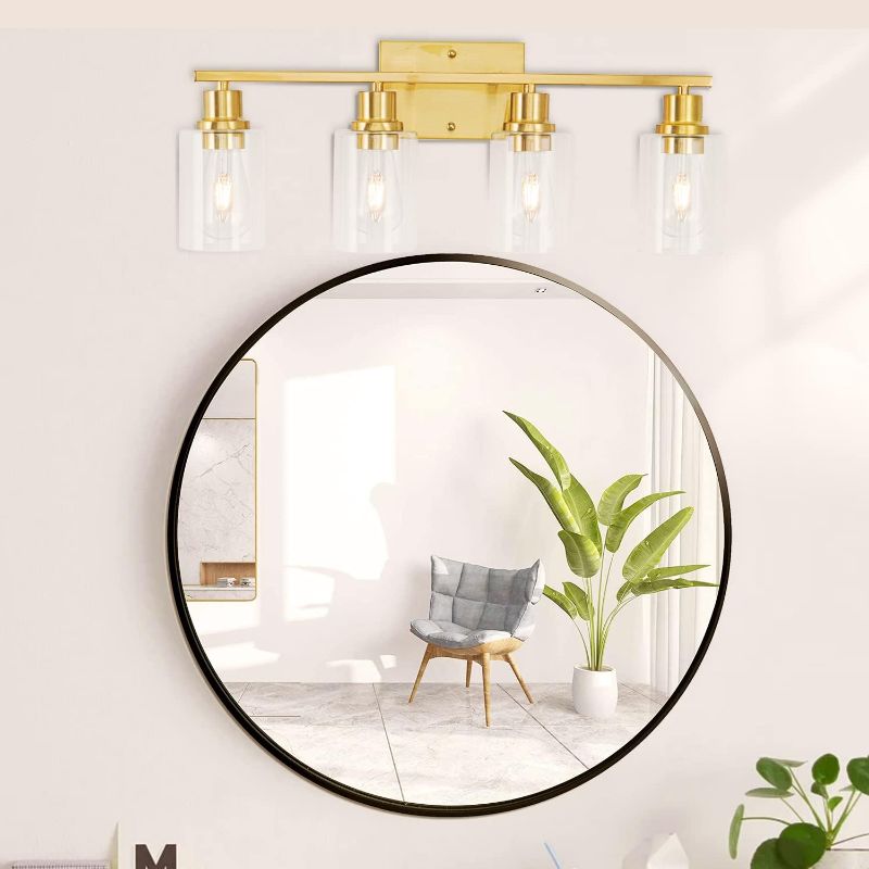 Photo 1 of 4-Lights Gold Bathroom Light Fixture,Brushed Brass Vanity Light with Clear Glass Shade, Modern Bath Wall Lights for Living Room,Hallway,Bedroom
***Stock photo shows a similar item, not exact*** 
