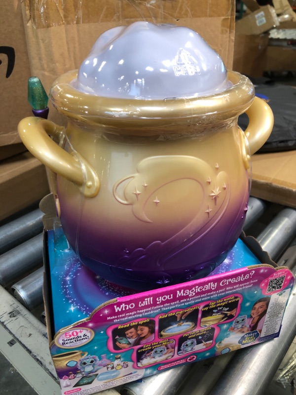 Photo 1 of Magic Mixies Magical Misting Cauldron with Interactive 8 inch Blue Plush Toy and 50+ Sounds and Reactions, Multicolor