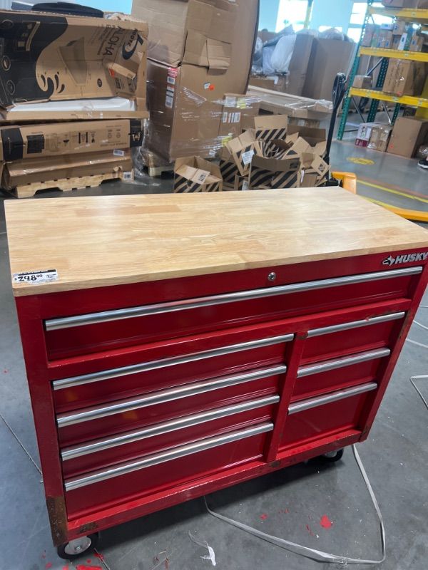 Photo 2 of *******Has some body damage to the paints*******
42 in. W x 18.1 in. D 8-Drawer Red Mobile Workbench Cabinet with Solid Wood Top

