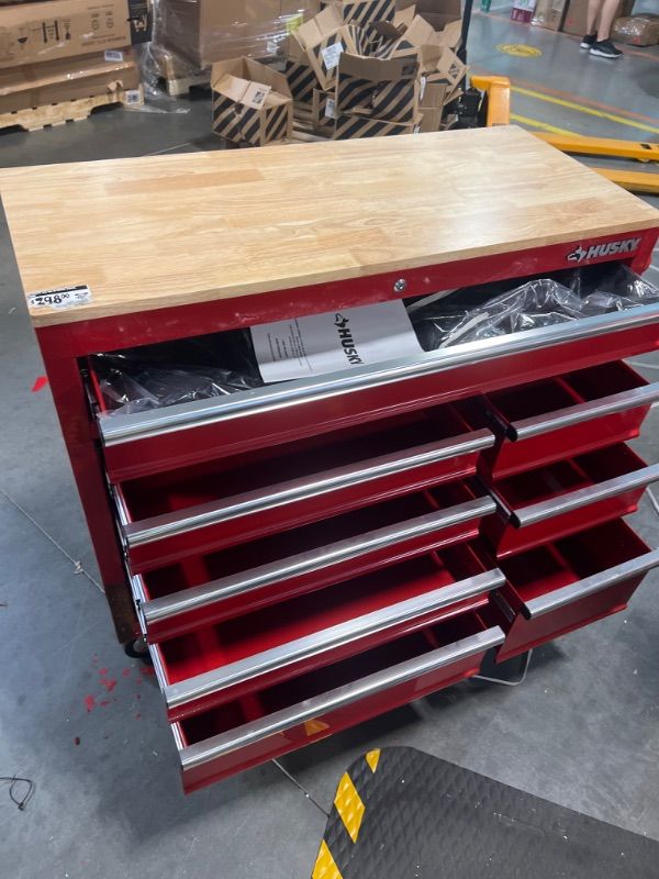 Photo 4 of *******Has some body damage to the paints*******
42 in. W x 18.1 in. D 8-Drawer Red Mobile Workbench Cabinet with Solid Wood Top

