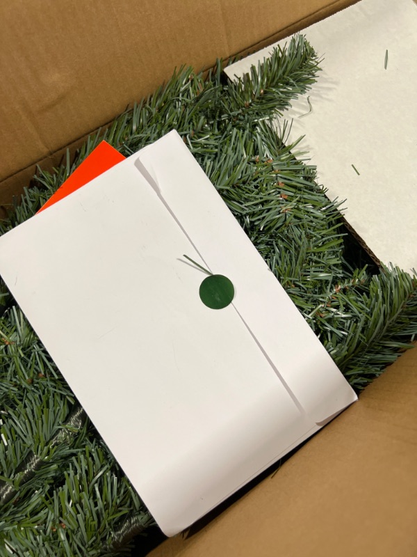 Photo 1 of 6.5 ft Festive Pine Christmas Tree