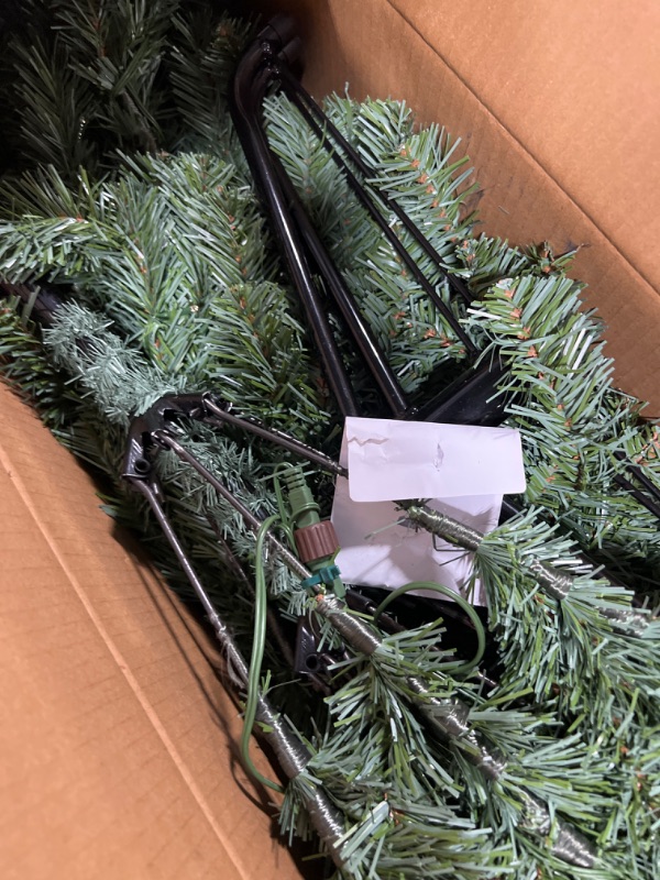 Photo 1 of 6.5 ft Festive Pine Christmas Tree