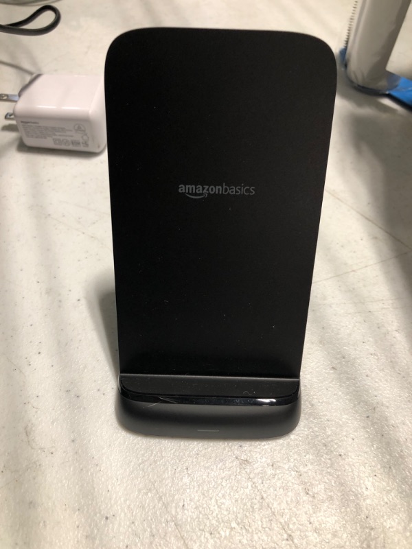 Photo 2 of Amazon Basics 10W Qi Certified Wireless Charging Stand (iPhone 15/14/13/12/11/X, Samsung), with USB Cable (No AC Adapter), Black