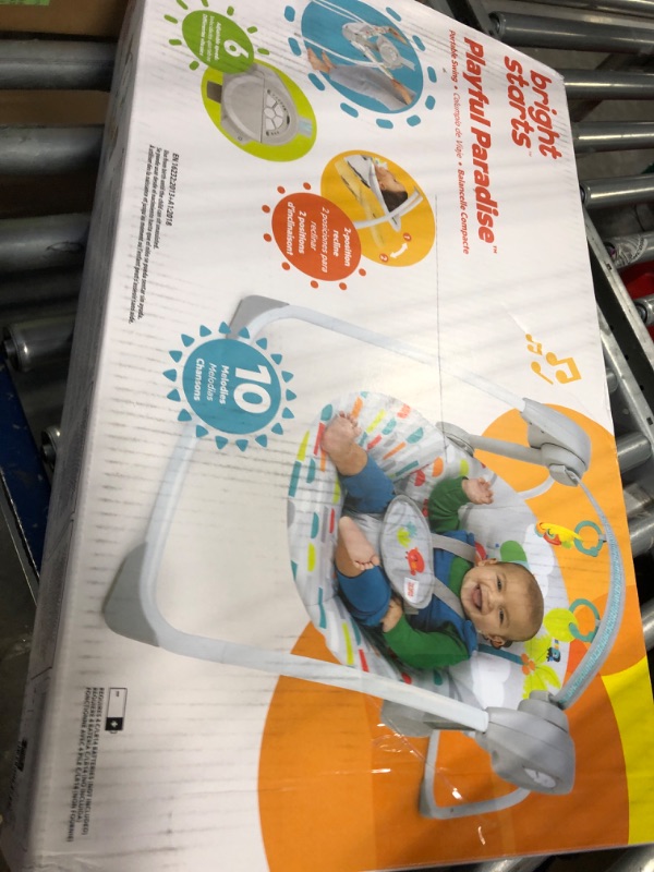 Photo 1 of Bright Starts Playful Paradise Portable Compact Automatic Baby Swing with Music, Unisex, Newborn +