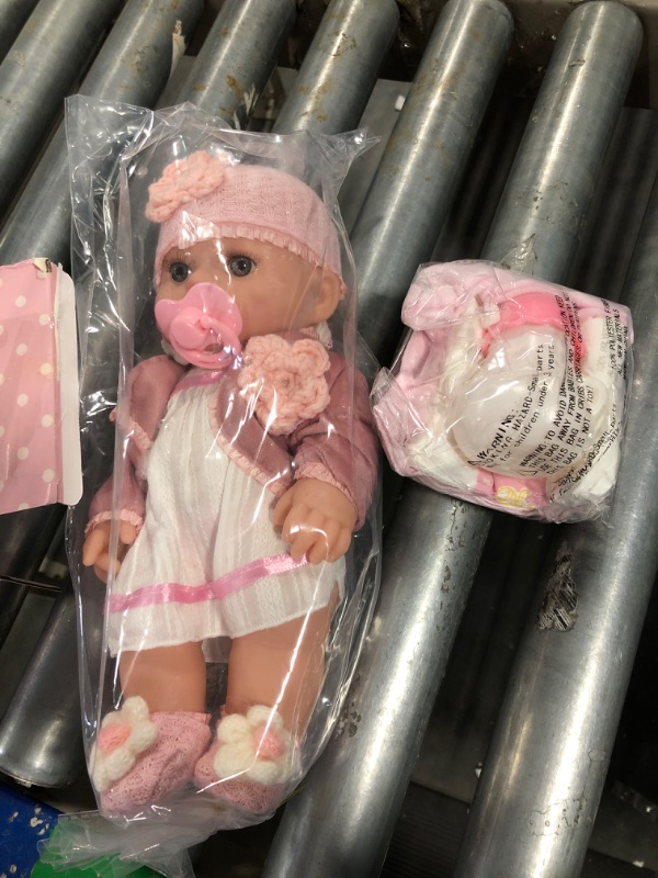 Photo 3 of DOTVOSY 12" Girl Baby Dolls Playset Adoption Realistic Soft Baby Doll with Clothes Accessories Include Outfits,Pacifier,Disposable Diaper,Blanket,Feeding Bottle Toy Stuff for Toddler 3 Ages and Up