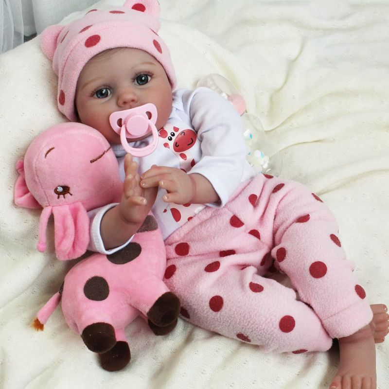 Photo 1 of CHAREX Reborn Baby Dolls - 22 inches Realistic Newborn Soft Vinyl Baby Dolls Toy for Kids Age 3+
