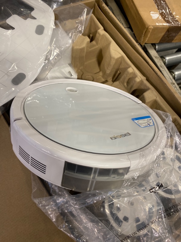 Photo 4 of **FOR PARTS****NO CLEANER** Bissell SpinWave Pet Robot, 2-in-1 Wet Mop and Dry Robot Vacuum, WiFi Connected with Structured Navigation, 3347 ***USED****FOR PARTS ONLY***AS IS NO RETURNS ALL SALES ARE FINAL*** 