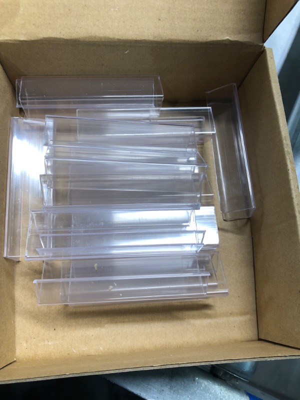 Photo 1 of Outus Plastic Label Holder Wire Shelf Label Holder 3 x 7/8 Inches Clip on Tag Holders Ticket Holder (30 Pieces)