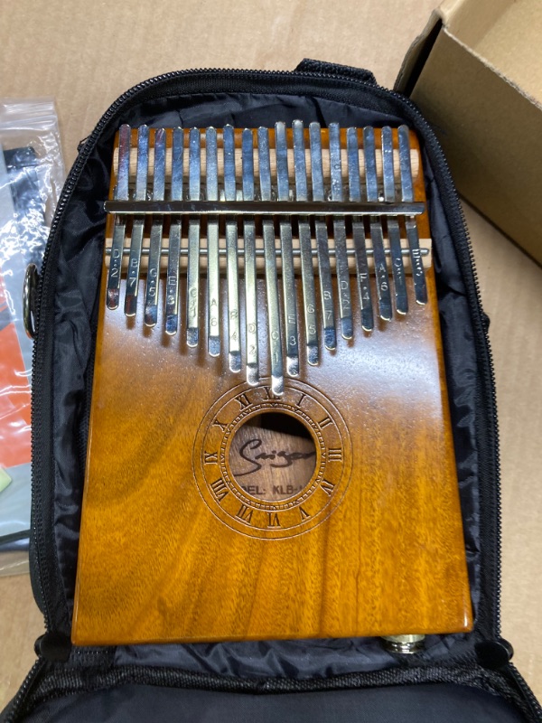 Photo 3 of EQ Kalimba Thumb Piano 17 Keys,Portable Mbira with Pickup Acacia Koa Wood Finger Piano Kalimbas Gifts for Beginners Kids Adults with 10 foot Cable Study Instruction Carry Bag Kalimba Koa