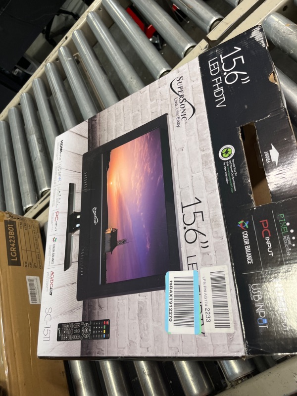 Photo 1 of BAXT912270 AC/DCIN SC-15T1 FRONT 15.6" LED FHDTV SUPERSONIC Live. Lile Easy. 15.6" LE PIXEL REDUCTION
