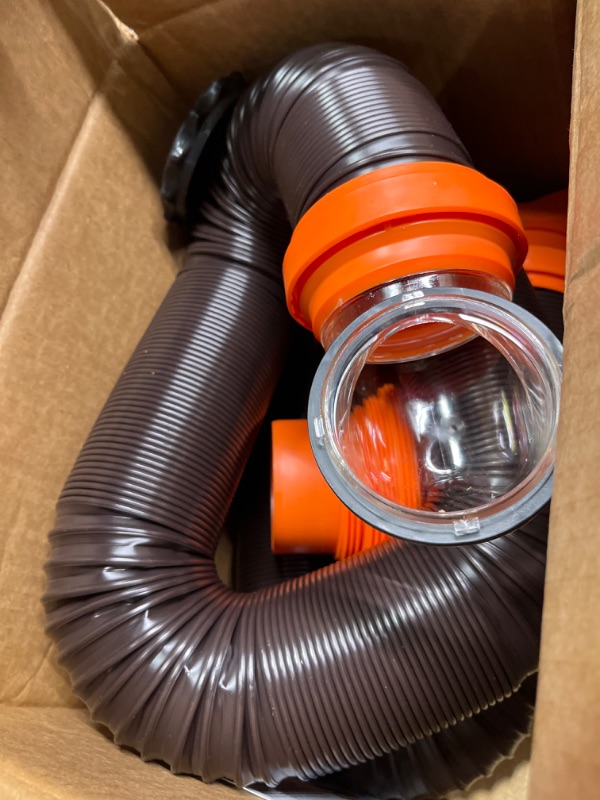 Photo 3 of Camco RhinoFLEX RV Sewer Hose Kit with Swivel Transparent Elbow and 4-in-1 Dump Station Fitting, Brown, 15 Feet (39770) 15ft Sewer Hose Kit Frustration-Free Packaging