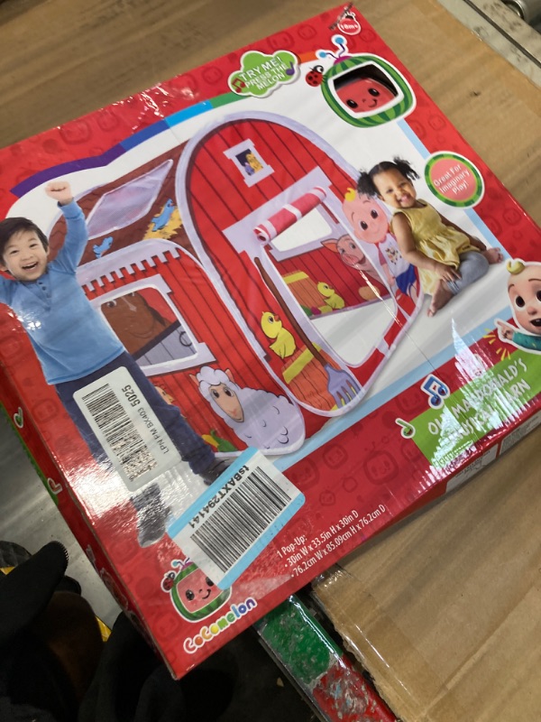 Photo 1 of CoComelon Old MacDonald's Musical Barn Pop Up Tent – Easy to Setup Playhouse for Kids | Plays Music, Roll Up Door and Mesh Windows