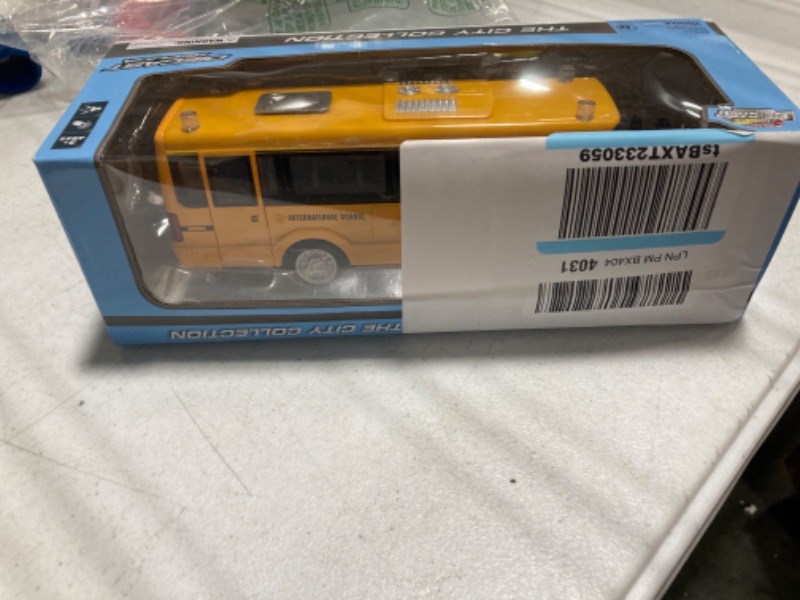 Photo 2 of CORPER TOYS School Bus Toy Die Cast Vehicles Yellow Large Alloy Pull Back 9'' Play Bus with Sounds and Lights for Kids