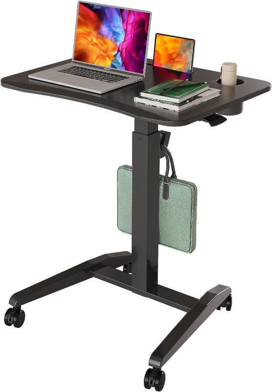 Photo 1 of Gibbon Mounts Mobile Standing Desk, Height Adjustable Rolling Laptop Desk with Cup Holder, 27 inches Portable Sit Stand Desk with Wheels and Hook, Pneumatic...
