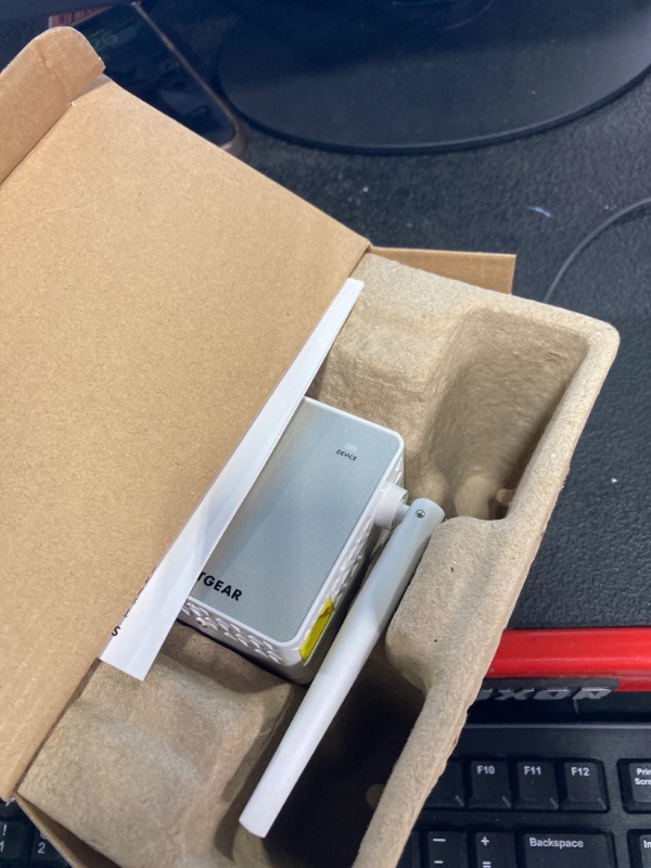 Photo 1 of NETGEAR Wi-Fi Range Extender EX6120 - Coverage Up to 1500 Sq Ft and 25 Devices with AC1200 Dual Band Wireless Signal Booster & Repeater (Up to 1200Mbps Speed), and Compact Wall Plug Design WiFi Extender AC1200
