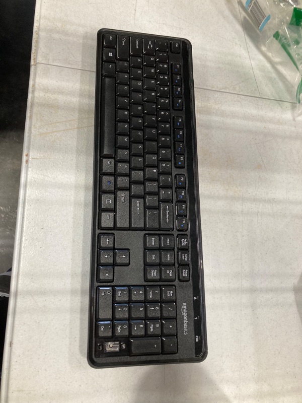 Photo 2 of Amazon Basics Wireless Computer Keyboard and Mouse Combo - Quiet and Compact - US Layout (QWERTY)