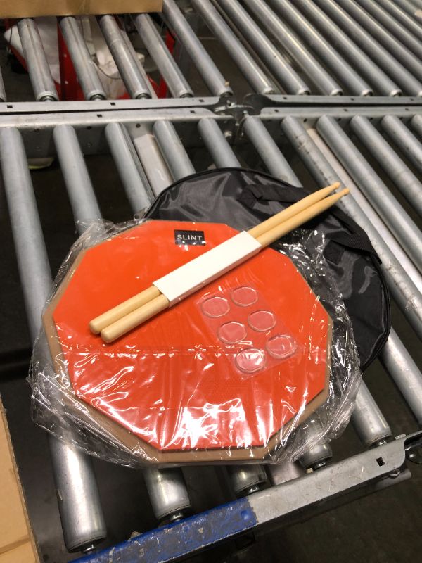 Photo 3 of 12 Inch Snare Drum Practice Pad and Sticks - Double Sided Silent Practice Drum Pad and Sticks & Storage Bag for 4 Inch Snare Drum Pad- Snare Practice Pad for Drumming with Two Surfaces (Orange)