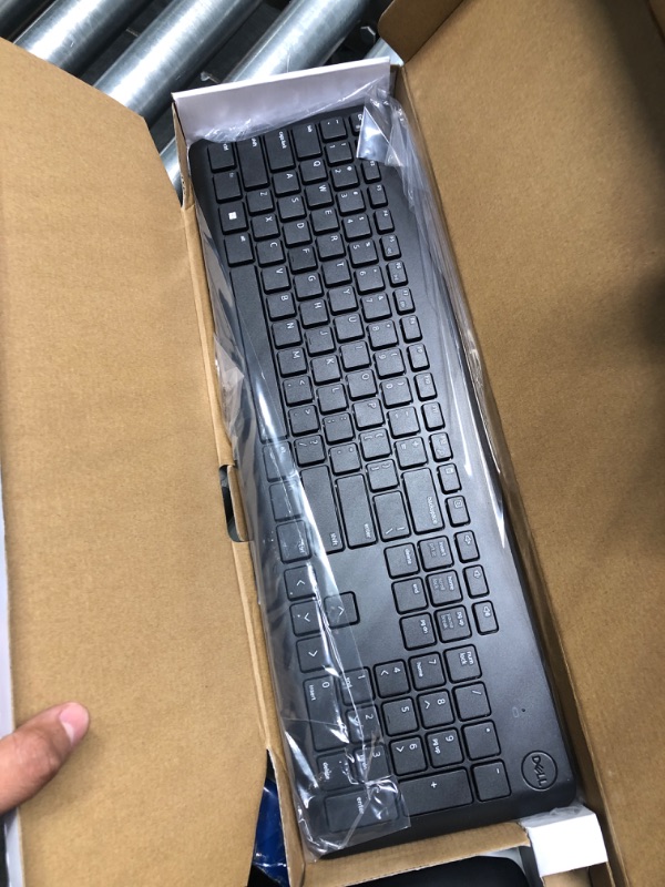 Photo 1 of Dell Wireless Keyboard and Mouse - KM3322W, Wireless - 2.4GHz, Optical LED Sensor, Mechanical Scroll, Anti-Fade Plunger Keys, 6 Multimedia Keys, Tilt Leg - Black
