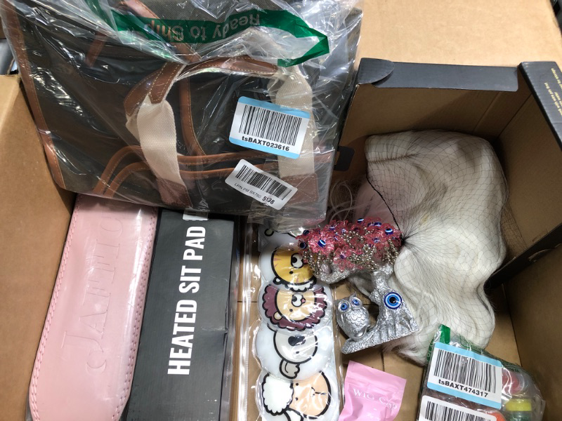 Photo 1 of ***AS IS / NO RETURNS -  FINAL SALE***

BADDIE BOX 

Gym Belt for the extra support 
Heating paf for those sore days
Hot and Cold Kawaii Animal pads for eye puffiness or soothing cramps
A New Hand Bag
A WHITE WIG
Glitter 
And a all seeing eye statue to bl