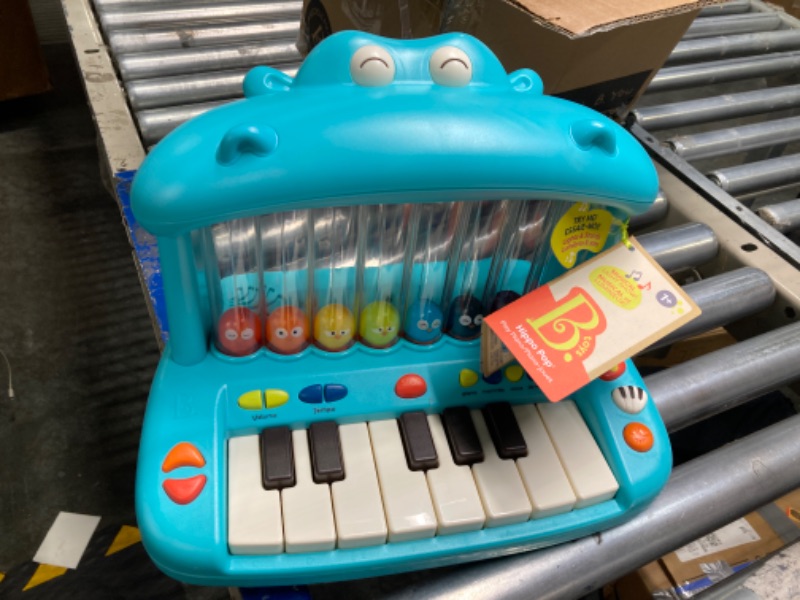 Photo 2 of B. toys- Hippo Pop- Musical Toy Keyboard – Play Piano – Songs, Sounds & Lights – Musical Instrument for Toddlers, Kids – 12 Months +