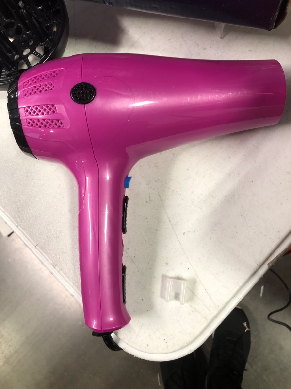 Photo 2 of Conair Hair Dryer with Retractable Cord, 1875W Cord-Keeper Blow Dryer Pink