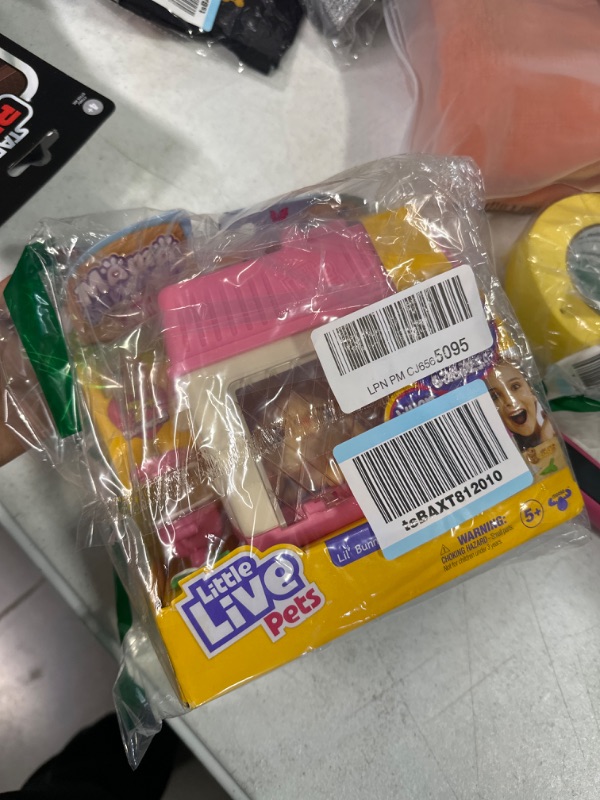 Photo 1 of Little Live Pets - Mama Surprise Minis. Feed and Nurture a Lil' Bunny Inside Their Hutch so she can be a Mama. She has 2, 3, or 4 Babies with Surprise Accessories to Dress Up The Babies