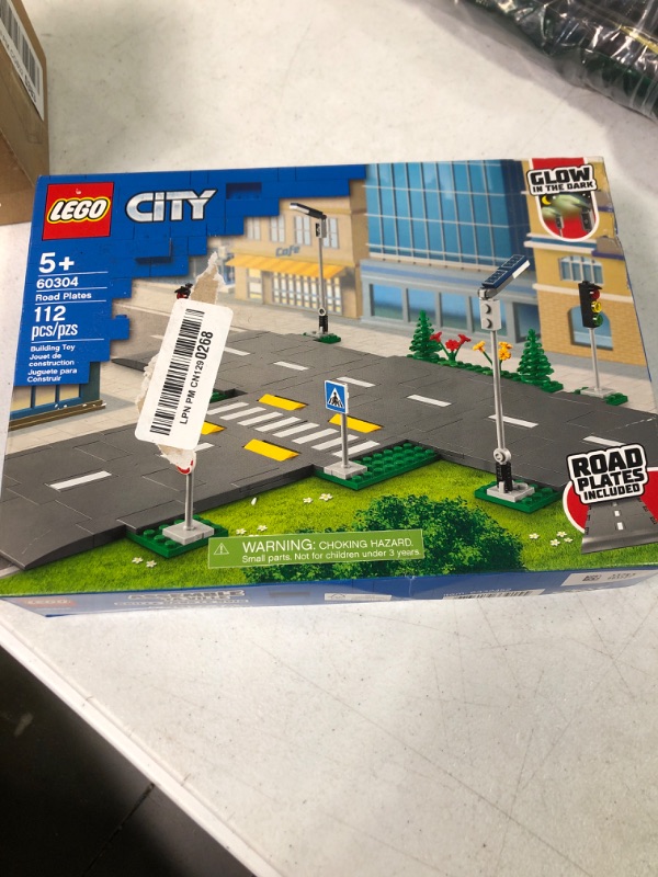 Photo 2 of LEGO City Road Plates Building Toy Set, 60304 with Traffic Lights, Trees & Glow in The Dark Bricks, Gifts for 5 Plus Year Old Kids, Boys & Girls