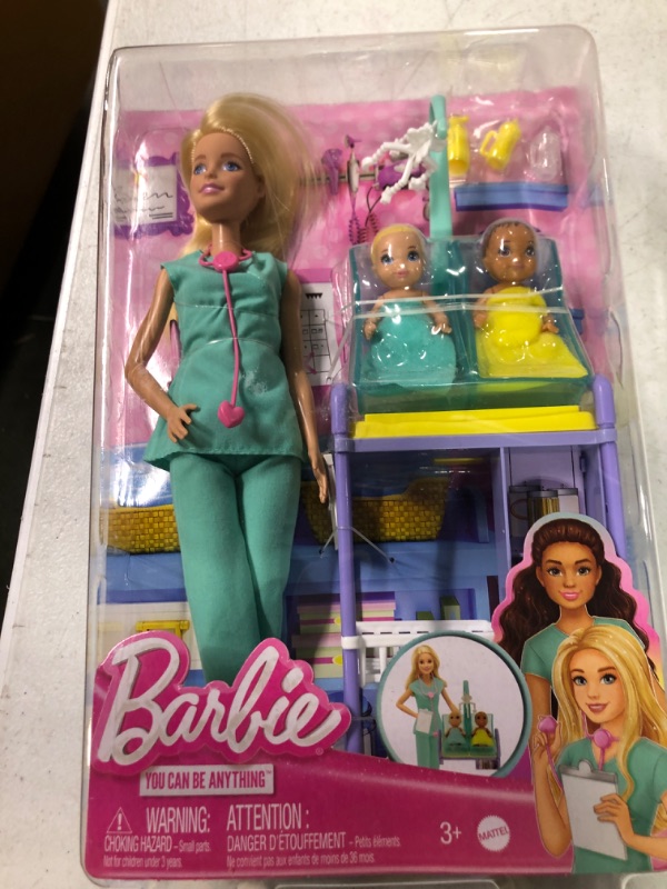 Photo 1 of Barbie Careers Doll & Playset, Baby Doctor Theme with Blonde Fashion Doll, 2 Baby Dolls, Furniture & Accessories Barbie Baby Doctor Doll