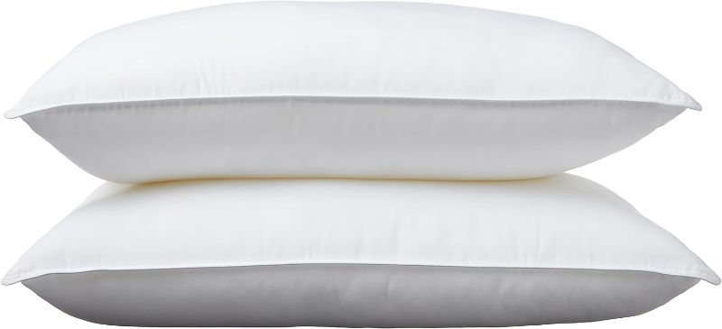 Photo 1 of Amazon Basics Down Alternative Pillows, Soft Density For Stomach and Back Sleepers, Standard, Pack of 4, White
***stock image is similar***
