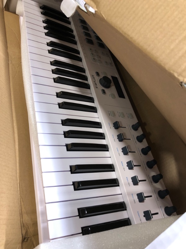 Photo 4 of Arturia KeyLab Essential 49 - 49 Key USB MIDI Keyboard Controller with Velocity Sensitive Synth Action Keys, 8 Drum Pads, 9 Faders, 9 Knobs and Analog Lab V Software Included