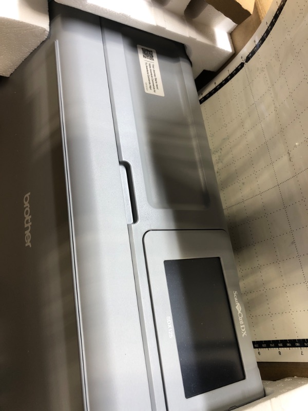 Photo 1 of Brother ScanNCut SDX125E Electronic DIY Cutting Machine with Scanner, Make Custom Stickers, Vinyl Wall Art, Greeting Cards and More with 682 Included Patterns Grey/Aqua