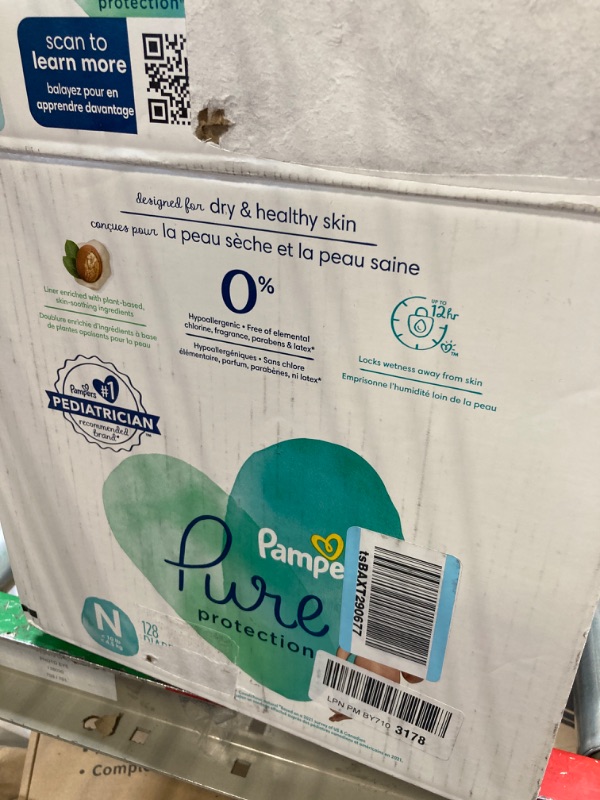 Photo 3 of Diapers Size 0, 128 Count - Pampers Pure Protection Disposable Baby Diapers, Hypoallergenic and Unscented Protection, Enormous Pack (Packaging & Prints May Vary) Size 0 (128 Count) ONE Month Supply