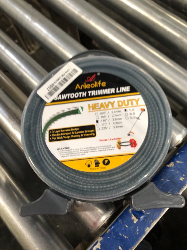 Photo 1 of A ANLEOLIFE 1-Pound Heavy Duty Sawtooth 140-mil-by-108-ft Dual Core String Serrated Trimmer Line Donut,with Bonus Line Cutter
