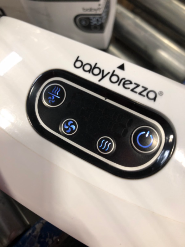 Photo 4 of Baby Brezza Bottle Sterilizer and Dryer Advanced – HEPA Filter And Steam Sterilization – Dries 33 Percent Faster Then Original - Universal Fit up to 8 Baby Bottles And 2 Sets of Pump Parts (Any Brand) Sterilizer-Dryer Advanced