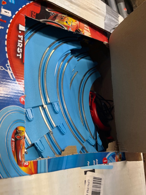 Photo 2 of Carrera First Disney/Pixar Cars - Slot Car Race Track - Includes 2 Cars: Lightning McQueen and Dinoco Cruz - Battery-Powered Beginner Racing Set for Kids Ages 3 Years and Up Disney Cars w/ Spinners