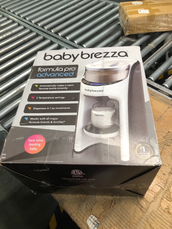 Photo 1 of New and Improved Baby Brezza Formula Pro Advanced Formula Dispenser Machine - Automatically Mix a Warm Formula Bottle Instantly - Easily Make Bottle with Automatic Powder Blending