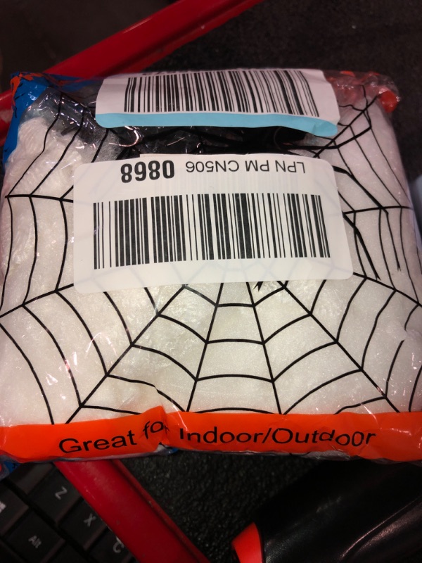 Photo 2 of AOSTAR Halloween Stretch Spider Webs Indoor & Outdoor Spooky Spider Webbing with 50 Fake Spiders for Halloween Decorations