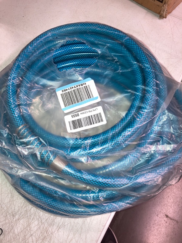 Photo 1 of Camco TastePURE Premium Drinking Water Hose, 35-Foot (22843) & RhinoFLEX Gray/Black RV Water Tank Clean Out Hose, 5/8 Inch, Orange (22990)