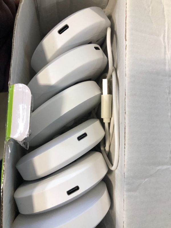 Photo 1 of YiaMia Under Cabinet Lighting, Motion Sensor Light Indoor LED Puck Lights, Rechargeable Wireless LED Closet Lights with Remote Control, Night Light for Kitchen, Cabinet, Hallway, Drawer (6 Pack) Multicolor 6 PCS