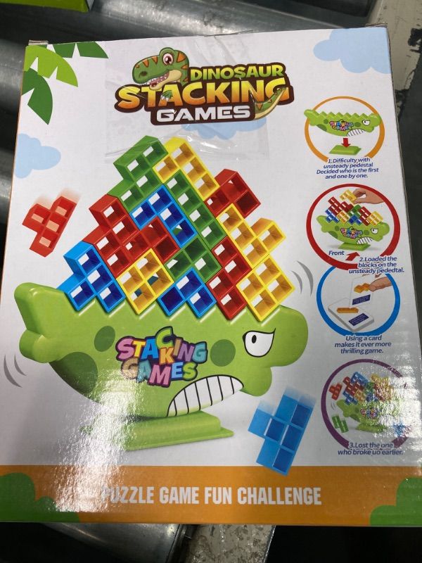 Photo 2 of Carlerait 64PCS Dinosaur Tetra Tower Game Balance Stacking Block Toys, Stack Attack Game Team Tower, 2 Players, Family Game Night, Party, Travel, Team Building Blocks Board Games for Kids Dino-64PCS