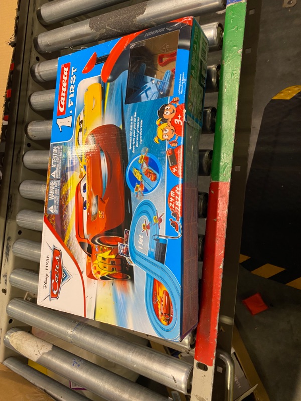 Photo 2 of Carrera First Disney/Pixar Cars - Slot Car Race Track - Includes 2 Cars: Lightning McQueen and Dinoco Cruz - Battery-Powered Beginner Racing Set for Kids Ages 3 Years and Up Disney Cars w/ Spinners