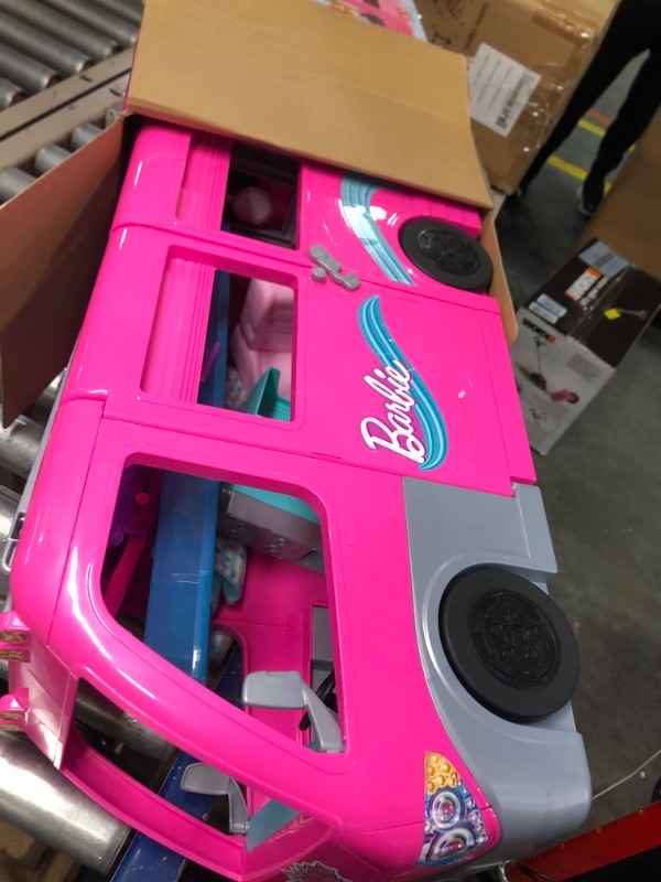 Photo 2 of Barbie Camper Playset, Dreamcamper Toy Vehicle with 60 Accessories Including Furniture, Pool and 30-Inch Slide