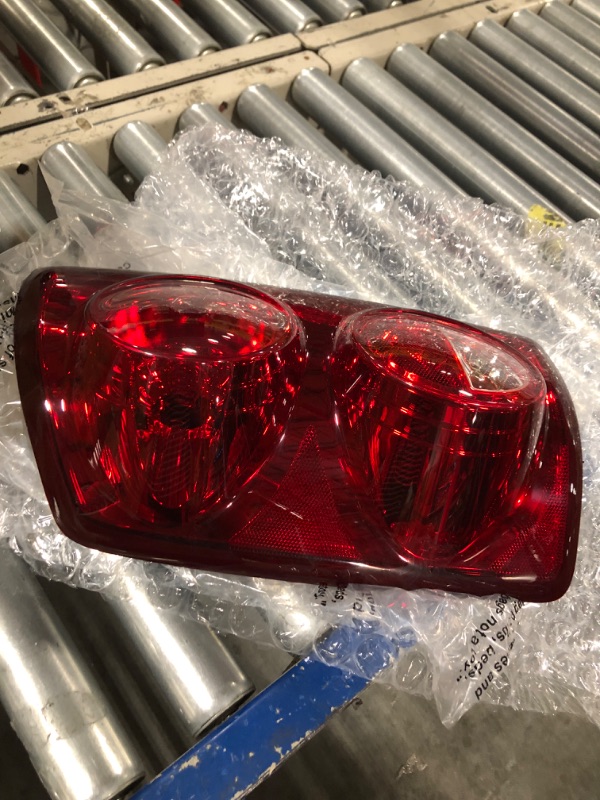 Photo 2 of TYC Left Tail Light Assembly Compatible with 2007-2008 Dodge Ram Pickup