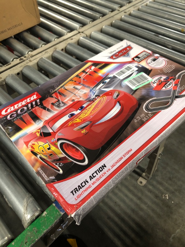 Photo 3 of Carrera GO!!! 63516 Official Licensed Disney Pixar Cars Battery Operated 1:43 Scale Slot Car Racing Toy Track Set with Jump Ramp Featuring Lightning McQueen and Jackson Storm for Kids Ages 5 and Up Disney Cars