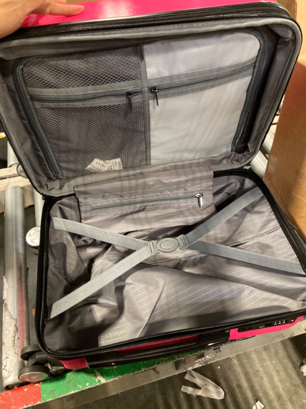 Photo 1 of Amazon Basics Geometric Travel Luggage Expandable Suitcase Spinner with Wheels and Built-In TSA Lock, 21.7-Inch - Pink
