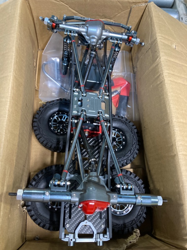 Photo 1 of RC Car Frame, Metal Carbon Fiber RC Car Frame Kit 313mm RC Crawler Tires Wheelbase Set for AXIAL SCX10